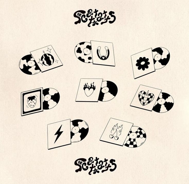 an old album cover with various designs on it