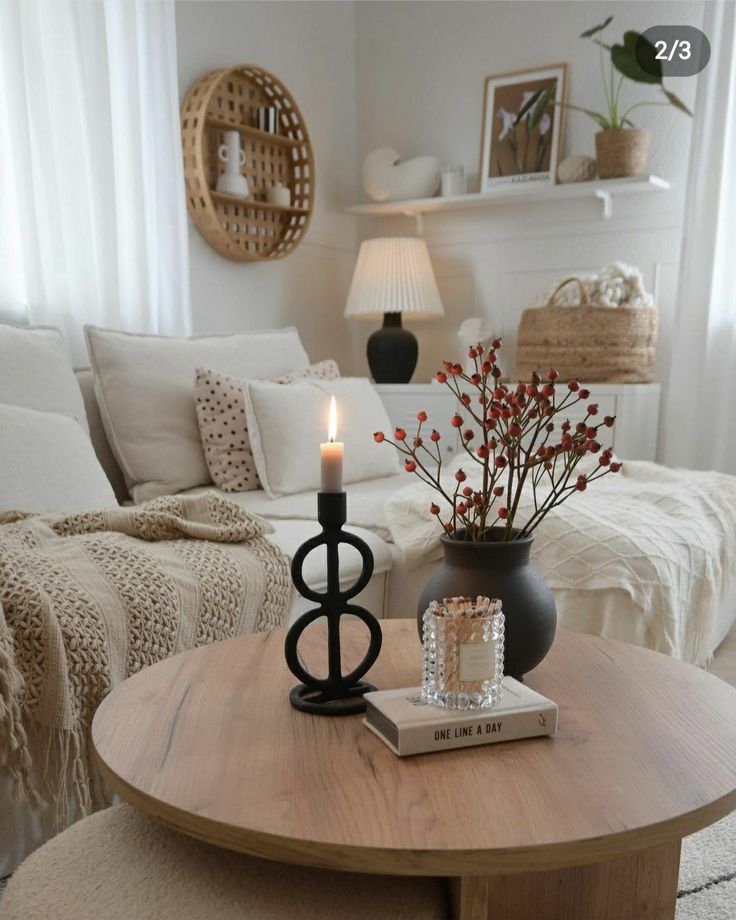 a coffee table with a candle on it in a living room