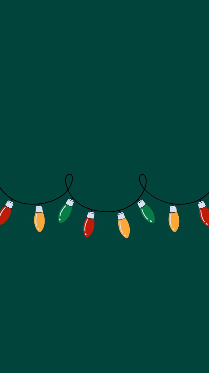 christmas lights are hanging on a green background