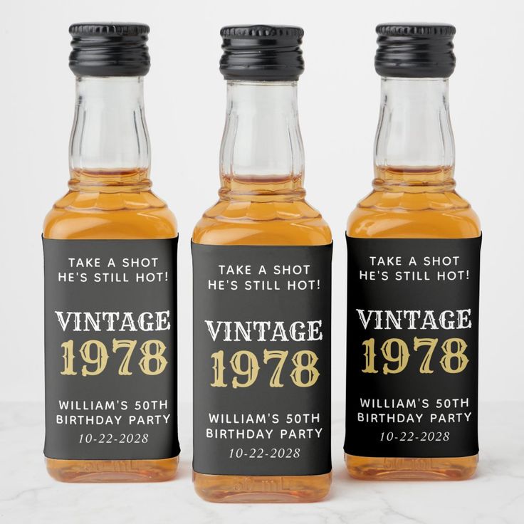 three bottles of whiskey are shown in front of a white background with the words, vintage birthday