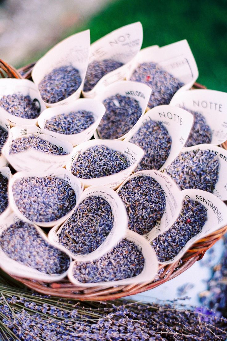 a basket filled with lots of lavender seeds