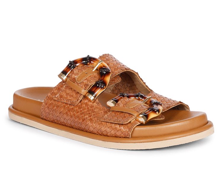 Step into a world where comfort meets chic style with the Venice, a flat sandal that boasts a unique double-strap design, adjustable bamboo buckles, and a blend of casual elegance and sophistication. Perfect for those sun-drenched beach days or a casual stroll in the city. From Saint G. Luxury Summer Footbed Sandals With Removable Insole, Modern Sandals With Woven Sole For Summer, Modern Woven Sole Sandals For Summer, Modern Sandals With Tang Buckle For Beach, Modern Beach Sandals With Tang Buckle, Chic Footbed Sandals With Adjustable Strap For Vacation, Chic Summer Double Strap Footbed Sandals, Chic Vacation Footbed Sandals With Adjustable Strap, Luxury Open Toe Sandals For Vacation