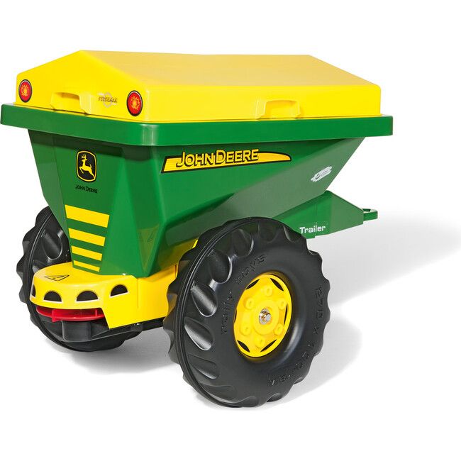 a green and yellow toy tractor with big wheels on it's back end,