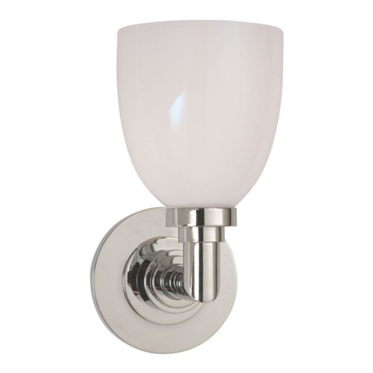 a chrome wall light with a white glass shade