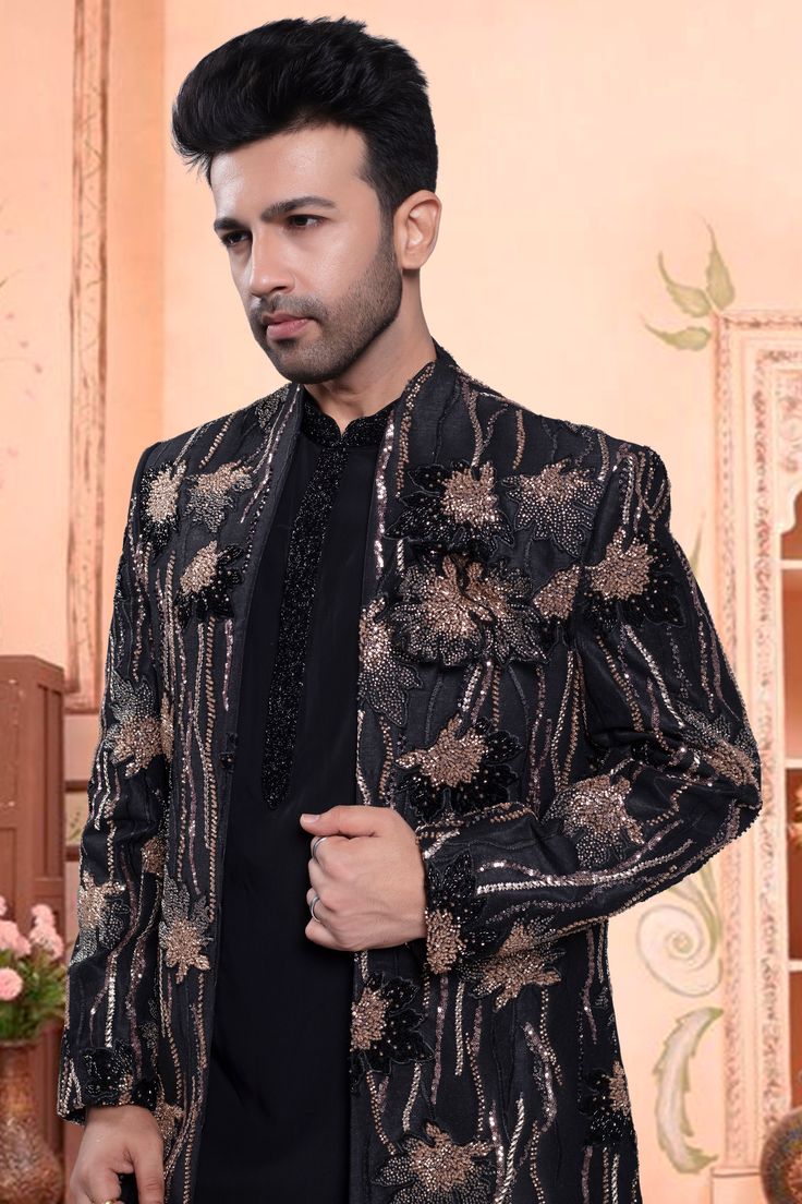 Get ready to look dashing in our Men's Sherwani! This open black jacket features stunning embroidery and bead details, making it the perfect choice for any special occasion. Stand out in style with our U2-S403 design. Traditional Black Embellished Sherwani, Festive Black Embellished Sherwani, Bollywood Black Semi-stitched Sherwani, Semi-stitched Black Sherwani With Dabka, Black Embroidered Semi-stitched Sherwani, Mens Sherwani, Bridal Lehenga, Black Jacket, Party Wear