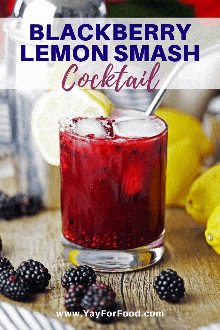 a blackberry lemon smash cocktail in a glass with ice and blackberries on the side