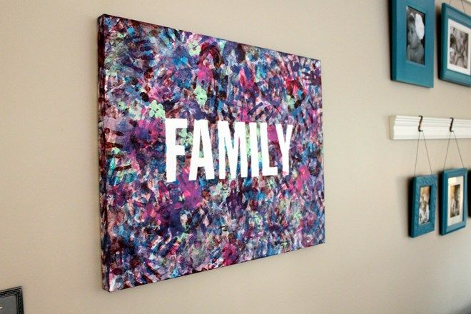 the family sign is hanging on the wall