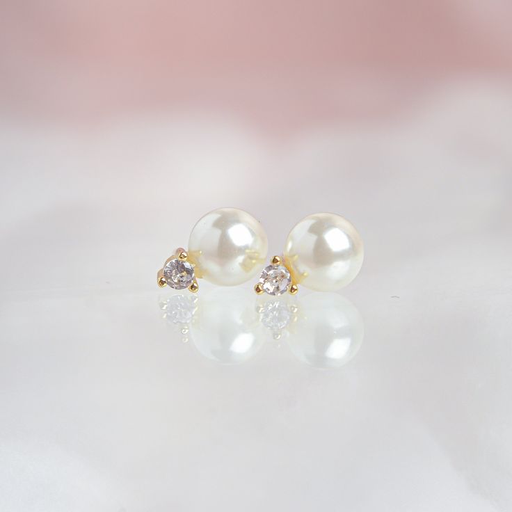 Handcrafted with a sterling silver base and 14k gold plating, these earrings will add a touch of delicacy to any look. Whether you’re dressing up for a special occasion or simply accenting your everyday look, these earrings are a must-have addition to your jewelry collection. 10x6mm 14k Gold Filled Round Earrings, Classic Gold Diamond Drop Earrings, Classic Single Pearl Earring In 14k Gold, Single Classic Pearl Earring In 14k Gold, Classic Single 14k Gold Pearl Earring, Classic 14k Gold Diamond Earrings With Elegant Design, Elegant 14k Gold Diamond Earrings, 14k Gold Classic Diamond Earrings With Elegant Design, Chic Tarnish-resistant Wedding Jewelry