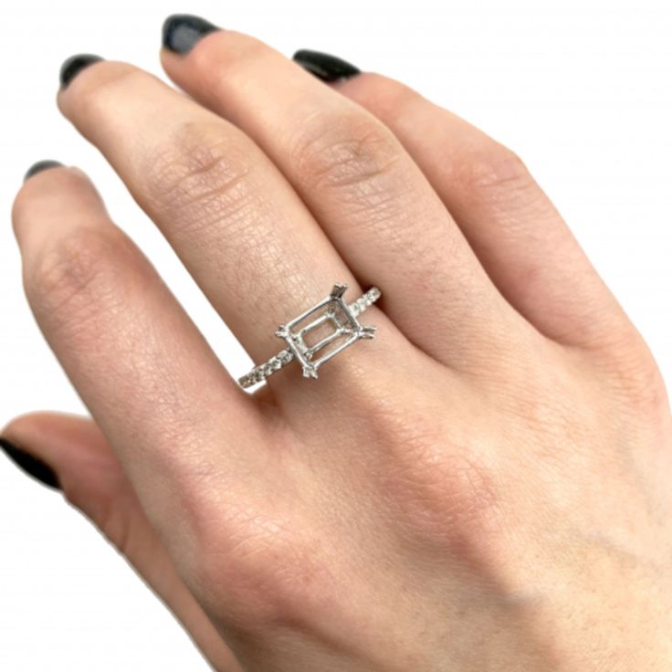 This Fancy Diamond Ring Semi Mount is Beautifully Lined up With Delicate Diamonds in 14K White Gold. Perfect for any Center Stone. Product Number:SMBIG43845 Center Stone Size:8 X 6 mm Center Stone Shape:Emerald Cut Metal Type:Gold Metal Purity:14k Metal Weight:1.92 gm Diamond Weight:0.18 Diamond Color:Gh Diamond Clarity:Si2 # of diamonds:16 Style number:RG0019 All styles can be made in Yellow Gold, White Gold, or Rose Gold within 6 WEEKS 1. We offer Easy PAYMENT PLAN 3 to 6-month payments. Pleas White Gold Asscher Cut Promise Ring, White Gold Emerald Cut Promise Jewelry, Promise White Gold Emerald Cut Jewelry, Asscher Cut White Gold Promise Ring, White Gold Baguette Cut Promise Jewelry, Promise Jewelry In White Gold With Baguette Cut, 14k White Gold Radiant Cut Promise Ring, Emerald Cut Platinum Promise Jewelry, Emerald Cut Platinum Jewelry For Promise