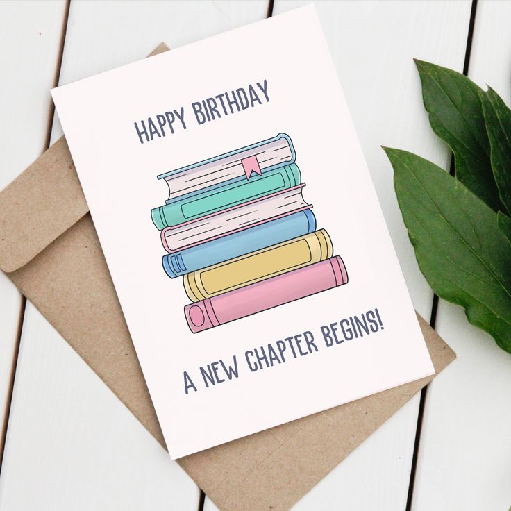 a birthday card with books on top of it