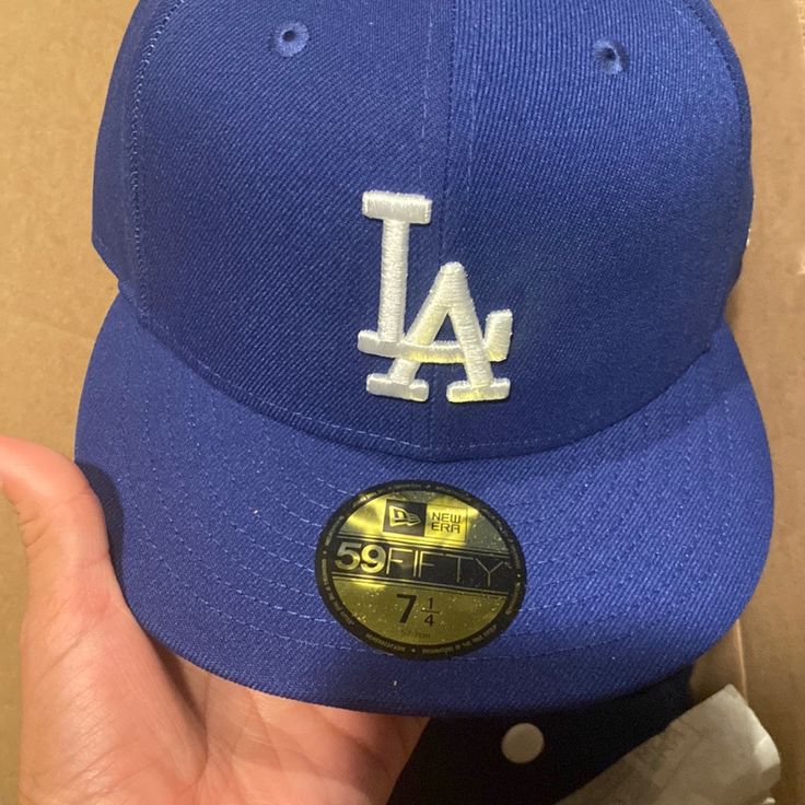 New Era La Dodger Cap On Field Blue Fitted Hat With Embroidered Logo For Streetwear, Classic Blue Cap Hat, Classic Blue Baseball Cap With Flat Brim, Classic Blue Snapback Fitted Hat, Blue Baseball Cap With Embroidered Logo Visor, Blue Fitted Hat For Baseball Season, Blue Fitted Hat For Baseball Season Streetwear, Blue Embroidered Snapback Fitted Hat, Classic Blue Flat Brim Baseball Cap