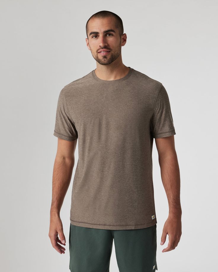 The Strato Tech Tee is the softest piece of workout apparel on the planet, doubling as your go-to t-shirt. With next-level comfort, our softest performance knit is quick drying and moisture wicking. | Vuori Strato Tech T-Shirt / Tee | Greige Heather | 3XL Vuori makes premium performance apparel inspired by the active Coastal California lifestyle; an integration of fitness, surf, sport, and art. Breaking down the boundaries of traditional activewear, we are a new perspective on performance appare Relaxed Fit Short Sleeve Tops In Recycled Polyester, Recycled Polyester Short Sleeve Athleisure Activewear, Athleisure Activewear With Short Sleeves In Recycled Polyester, Athleisure Short Sleeve Activewear In Recycled Polyester, Short Sleeve Athleisure Activewear In Recycled Polyester, Sporty Short Sleeve Tops In Recycled Polyester, Athleisure Short Sleeve Tops In Recycled Polyester, Casual Short Sleeve Tops In Recycled Polyester, Short Sleeve Recycled Polyester Activewear For Workout