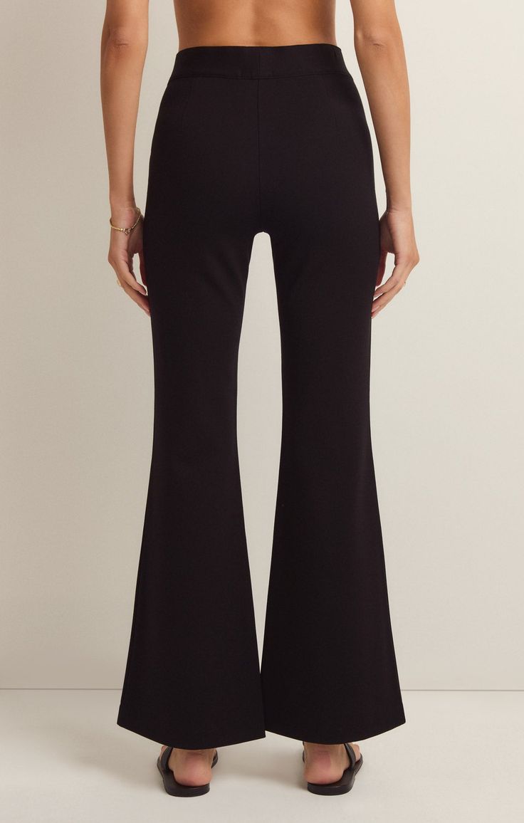 We love a good flare pant and the Do It All Flare Pant has it all! This chic high rise pant features a slim fit throughout the hips, a kick flare, and our fave detail; the supportive feel from the durable, stretchy fabric. Z SUPPLY Women's Do It All Flare Pant, Black, Extra Small Black Flare Wide Leg Pants, Black Flare Loungewear Pants, Sleek Flare Bottoms In Elastane, Black Flare Bottoms For Business Casual, High Waist Black Elastane Flares, Chic High Rise Black Flares, Black Flare Wide Leg Pants For Business Casual, Black Flare Bottoms For Loungewear, Chic Mid-rise Black Flares