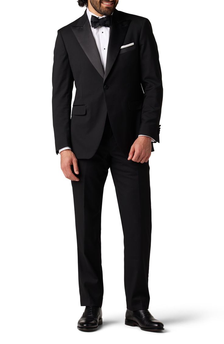 Fine satin covers the peaked lapels and a vertical trouser stripe on this charming tuxedo crafted from wrinkle-resistant performance stretch fabric. 32" inseam; 15 1/2" leg opening; 10" front rise (size 34W) Jacket has nonfunctional four-button cuffs; chest pocket; flap pockets; interior pockets; side vents Trousers have zip fly with hook-and-bar closure; slant pockets; back pockets Jacket is lined; trousers are lined to the knee 80% polyester, 18% rayon, 2% spandex Dry clean Imported Formal Fitted Single Breasted Sets, Formal Fitted Sets With Hidden Button Closure, Classic Black Tie Tuxedo With Lapel Collar, Classic Tuxedo With Lapel Collar For Black Tie, Tailored Notch Lapel Tuxedo With Single Button, Tailored Formal Tuxedo, Tailored Single Button Tuxedo With Notch Lapel, Tailored Tuxedo In Suiting Fabric For Formal Occasions, Formal Tuxedo Sets With Slim Fit