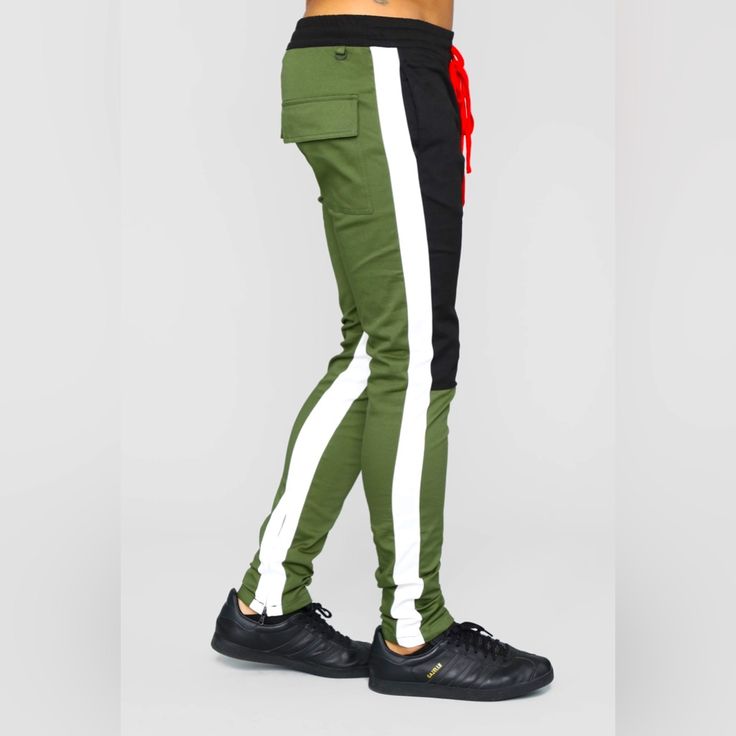 Fashion Nova Elastic Waist Extended Drawstring Side Hand Pockets Ankle Zipper Detail Material: 98% Cotton, 2% Spandex Color: Black, Olive Green, White And Red These Run On The Smaller Side. Material Is More Of A Denim/Jean Than A Sweatpants Feel. Stretch Joggers With Drawstring For Streetwear, Stretch Drawstring Joggers For Streetwear, Stretch Sweatpants With Side Stripes For Streetwear, Green Athleisure Bottoms With Side Stripes, Green Pants With Side Stripes For Streetwear, Green Streetwear Pants With Side Stripes, Casual Elastane Pants For Streetwear, Casual Elastane Streetwear Pants, Green Stretch Joggers For Streetwear