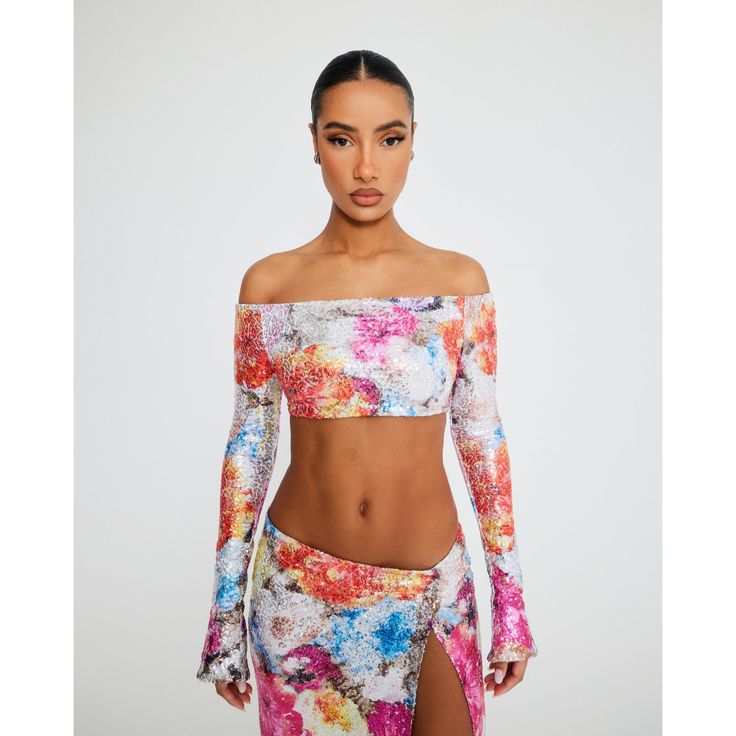 Price listed in USD. Description: Lined floral sequin knit long sleeves crop top. Sizing: XS, S, M, L, XL XS: Bust: 30”-32” Waist: 23”-24”,Hips: 33”-35” S: Bust: 33”-34” Waist: 25”-26” Hips: 36”-37” M: Bust: 35”-36” Waist: 27”-28” Hips:38”-39” L: Bust : 37"-38" Waist: 29"-31" Hips: 40"-41" XL: Bust 39”-40” Waist : 32”-33” Hips: 42”-43” Model is 5ft 7" and wears size small-regular. If you are worried about sizing issues, please email us at info@brielleofficielle.com with your measurements and we Cropped Sequin Tops For Spring, Cropped Sequin Top For Fall, Sequined Cropped Top For Fall, Floral Print Cropped Top For Night Out, Cropped Floral Print Top For Night Out, Cropped Top With Floral Print For Night Out, Chic Long Sleeve Sequined Crop Top, Chic Floral Print Crop Top For Party, Chic Floral Print Crop Top For Fall