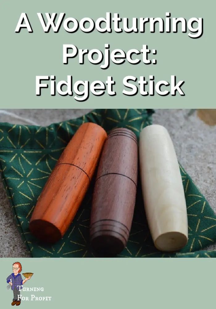 three wooden objects sitting on top of a green cloth with the words, a woodturning project fidgett stick