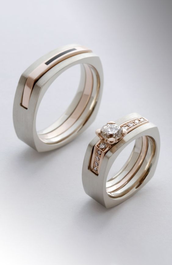 two wedding rings with diamond accents on each one, set in white and rose gold