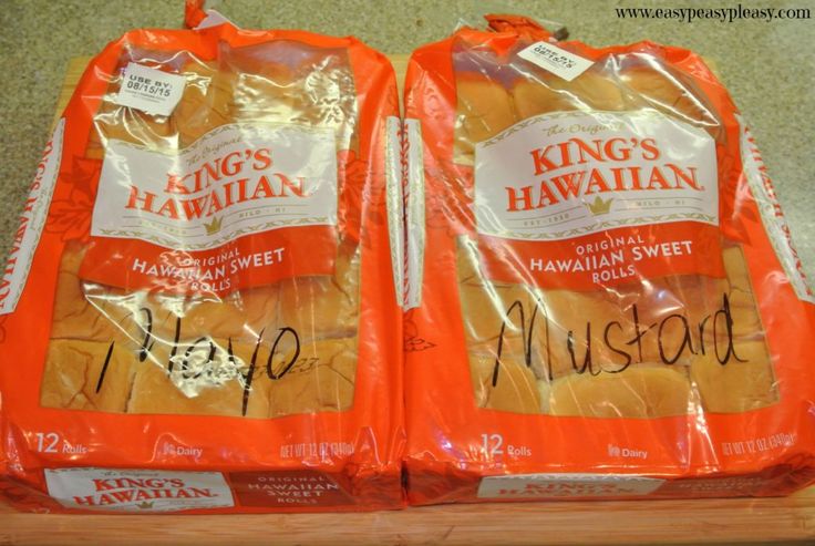 two bags of bread sitting on top of a counter