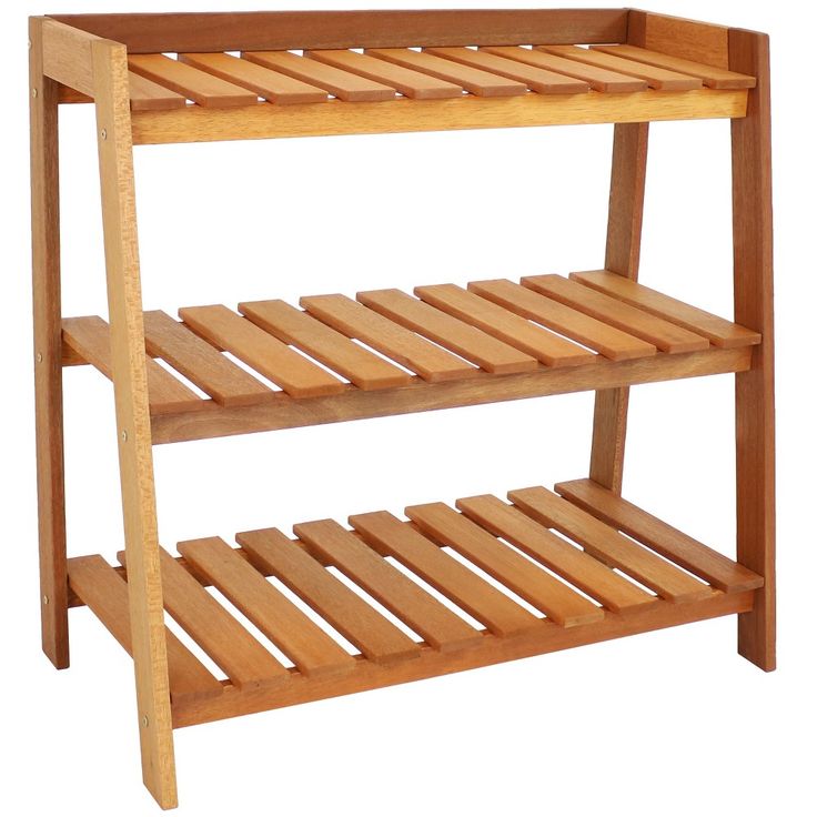 a wooden shelf with two shelves on each side