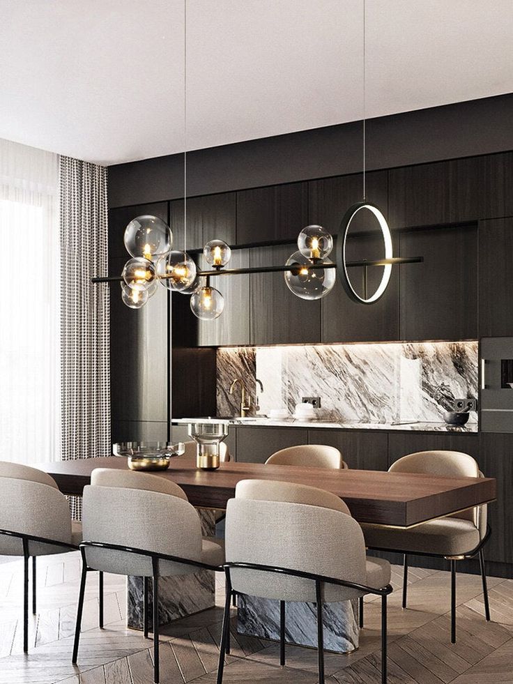 an elegant dining room with marble walls and wooden flooring, modern chandelier hanging from the ceiling