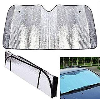 the front and rear windshield sun shades are shown in two different pictures, one is silver