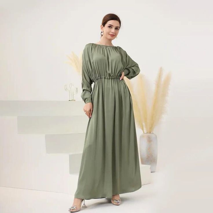 Introducing the 'Atheer' Oversized Modest Dress from Jaela Fashion – where comfort meets style. Get ready to embrace the beauty of an oversized maxi-length dress that's all about elegance and ease. With chic batwing sleeves and an elastic waist, this dress offers both a stunning silhouette and unmatched comfort. Whether you're headed to an event or simply stepping out, the 'Atheer' dress celebrates modesty in the most fashionable way possible. It's time to make a statement and feel effortlessly Flowy Maxi Dress With Batwing Sleeves, Modest Embroidered Maxi Abaya, Modest Long-sleeve Maxi Dress With Smocked Back, Embroidered Long Sleeve Modest Abaya, Spring Modest Maxi-length Thobe, Modest Floor-length Abaya, Every Step You Take, Batwing Sleeve, Modest Dresses