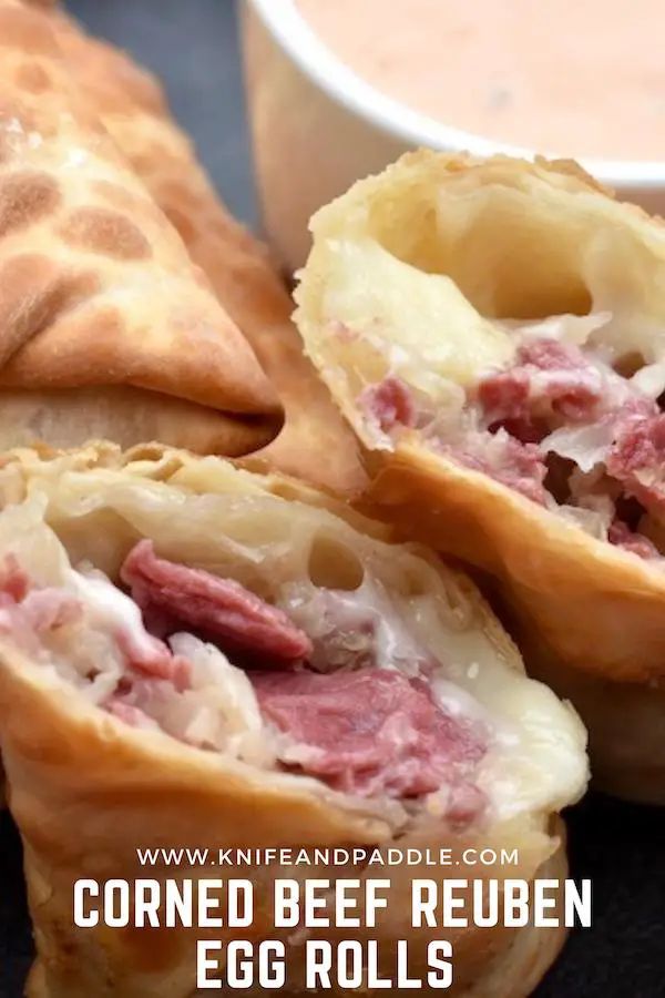 corned beef roll with egg rolls and dipping sauce on the side, closeup