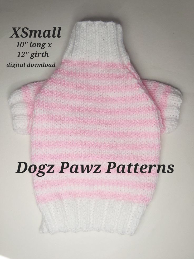 a pink and white knitted sweater with the words dogz pawz patterns on it