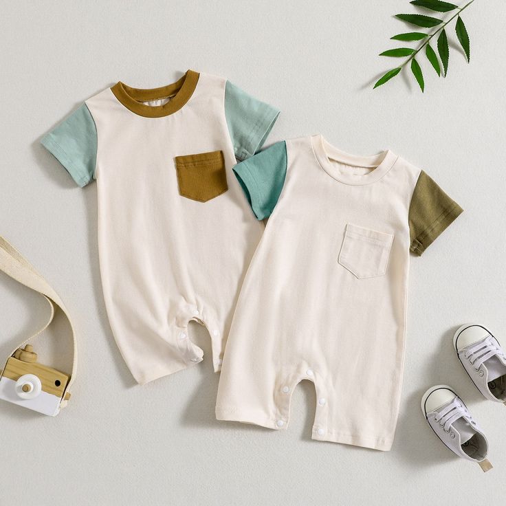 This super cute jumpsuit is made with a soft cotton blend and has a comfortable fit so your sweetheart can run, play and cuddle as much as their little heart desires. Playful Short Sleeve Bubble Romper For Playdate, White Cotton Jumpsuits For Playtime, Cute Short Sleeve Bubble Romper For Playdate, White Cotton Jumpsuits And Rompers For Playtime, Green Cotton Jumpsuit For Loungewear, Green Cotton Jumpsuits And Rompers For Loungewear, Cotton Bubble Romper For Playwear, Cute Short Sleeve Jumpsuits And Rompers For Playtime, Casual Cotton Bodysuit For Playtime