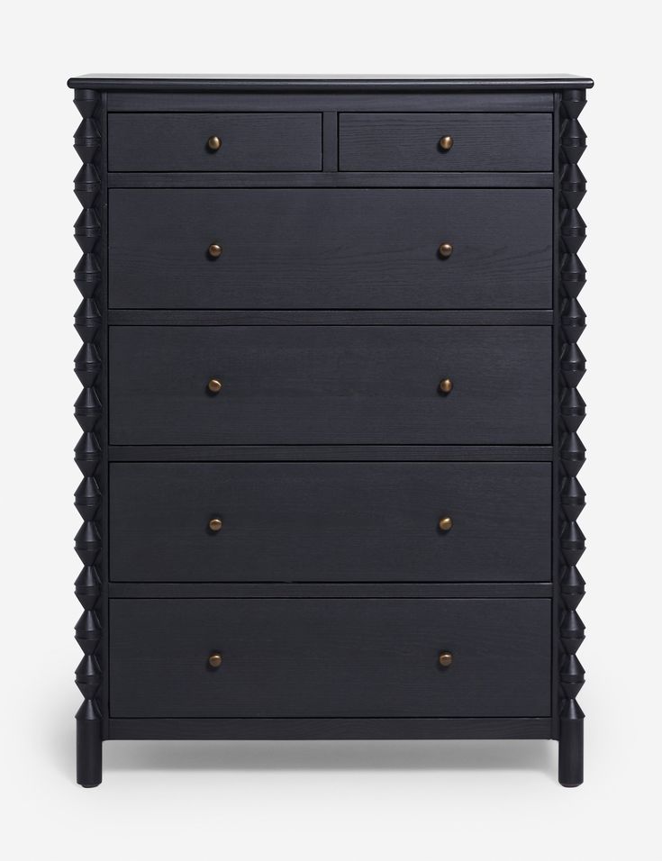 a black dresser with gold knobs on the top and bottom drawers, against a white background