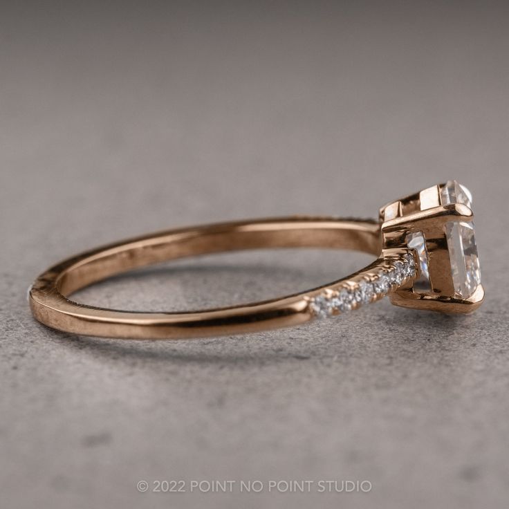 an engagement ring with a princess cut diamond