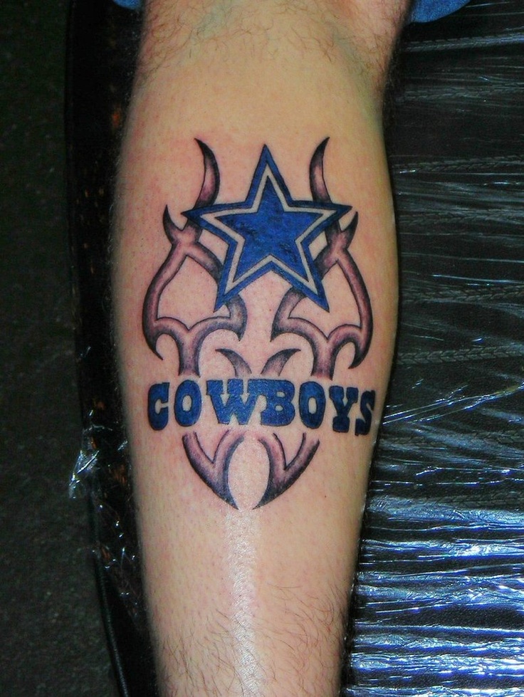 a tattoo with the word cowboys on it