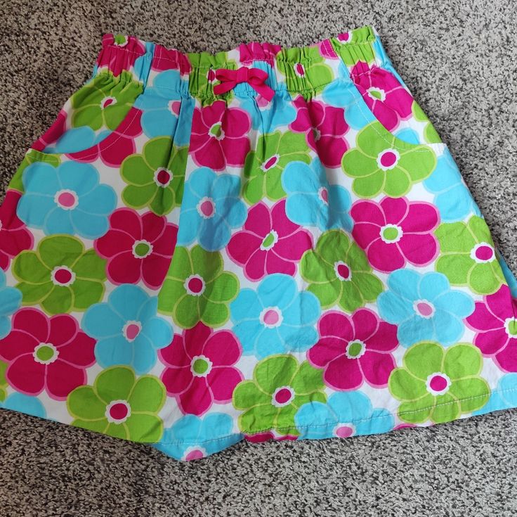 Never Worn, Plastic Tag Is Still Attached. Unlined Green, Blue And Pink Skirt With Pockets. Summer Playtime Cotton Skirt, Summer Cotton Skirt For Playtime, Cute Cotton Skirt With Floral Print, Cotton Skirt For Summer Playtime, Multicolor Spring Shorts For Playtime, Multicolor Playtime Shorts For Spring, Spring Cotton Skirt For Playtime, Multicolor Spring Playtime Shorts, Cotton Skirt For Playtime In Spring