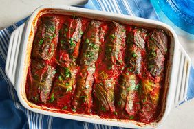 a casserole dish filled with meat covered in marinara sauce