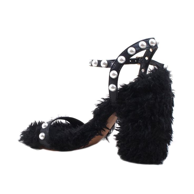 Pearl embellished Vegan shearling with man made sole Ankle buckle closure Heel measures approx. 4" H Imported