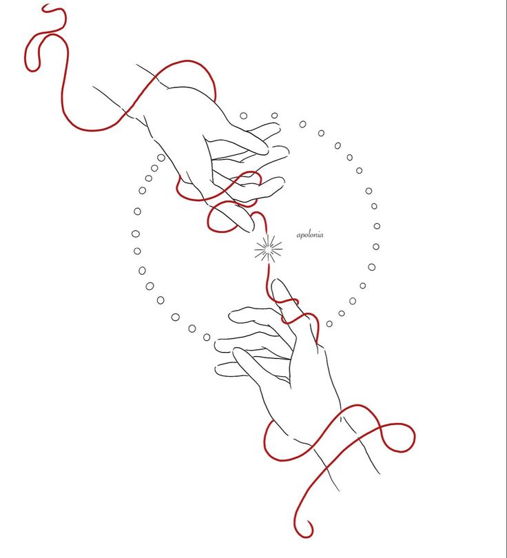 two hands reaching towards each other with red thread on them and one hand holding something