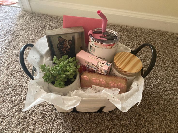 a basket filled with items on top of a carpet