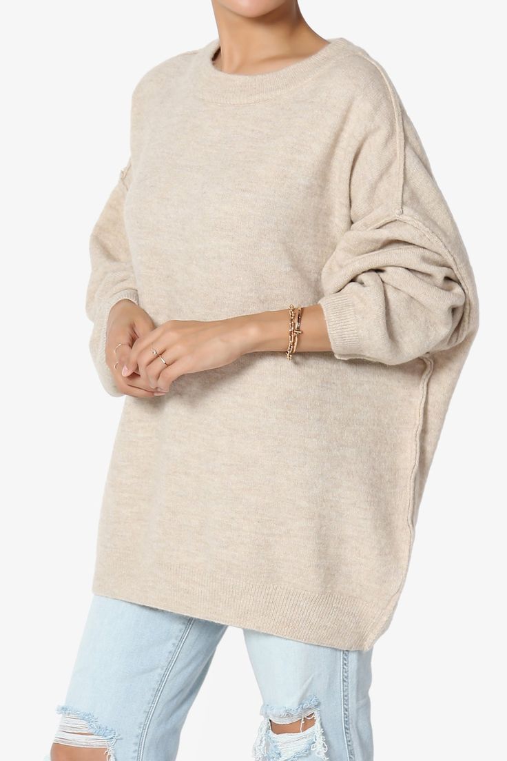 Oversized sweater with a speckled melange knit finish and a voluminous, silhouette. Classic crew neck, long sleeves, raw seam details. Dropped shoulders and a slouchy silhouette make this an easy layer to toss on over dresses or jeans and tees alike.Lightweight ribbed melange knitDolman long sleeves with raw seam detailsSlouchy oversized silhouette, Ribbed trimFits large to US size, take one size smaller than normal, S=6-8Model size : 5'3" height, 34" bust, 24" waist, 34" hip, and is wearing a s Oversized Cozy Knit Top For Layering, Cozy Oversized Knit Top For Layering, Oversized Textured Knit Top For Fall, Oversized Textured Knit Top, Oversized Textured Knit Acrylic Sweater, Oversized Soft Knit Top, Oversized Fall Cable Knit Top, Oversized Cable Knit Top For Fall, Trendy Oversized Soft Knit Top