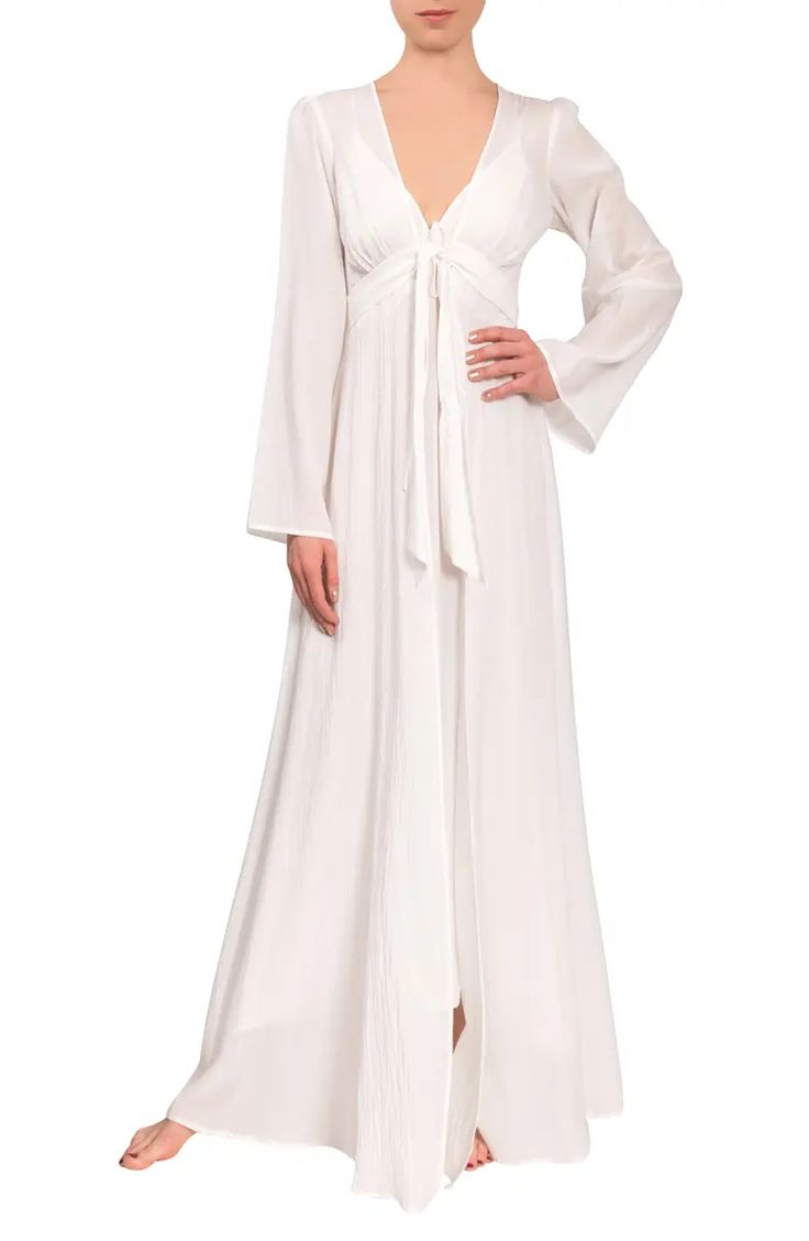 Free shipping and returns on Diane Cotton Duster Robe at Nordstrom.com. Start and end your day with a little glamour by wrapping yourself up in an elegant floor-length robe cut from crisp, lightweight cotton. Long Sleeve Tie Waist Sleep Robe, Long Sleeve Sleep Robe With Tie Waist, Chic Long Sleeve Sleep Robe, Chic Wrap Robe With Tie Waist, Elegant Daywear Maxi Dress With Tie Waist, Feminine Long Sleeve Robe For Daywear, Chic Long Sleeve Robe For Daywear, White Tie Waist Long Sleeve Robe, Elegant Wrap Maxi Dress For Daywear