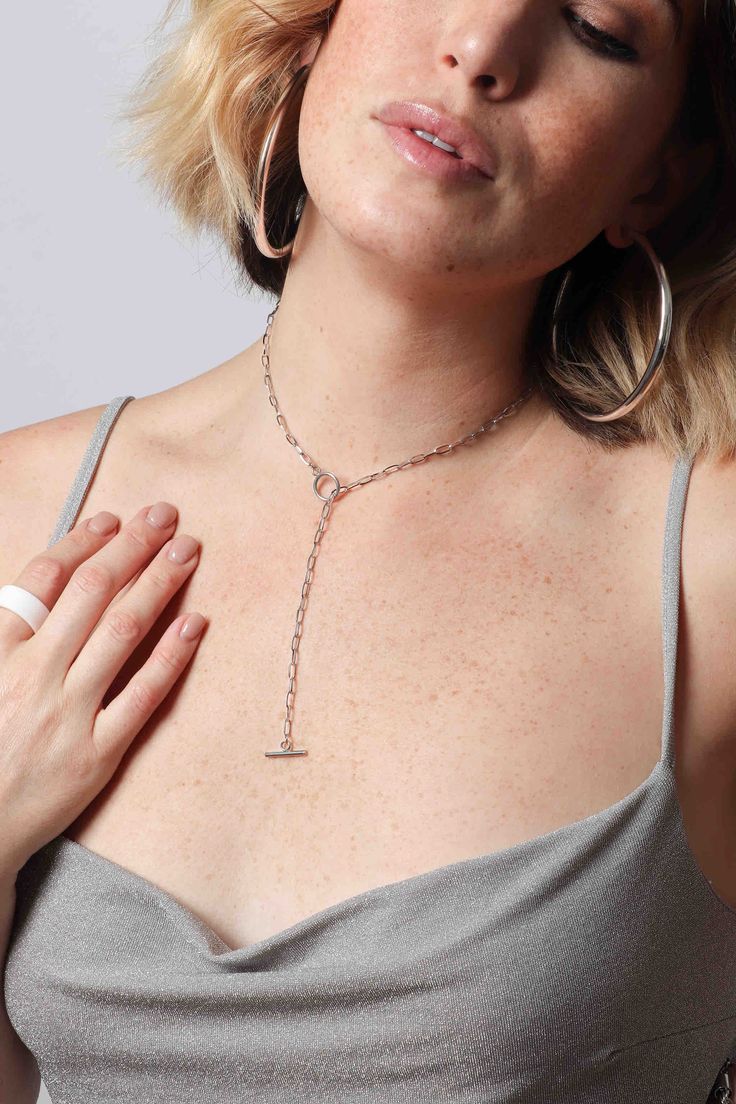 The only lariat you will ever need has officially arrived. Meet Supreme — our best-selling, multifunctional lariat that can be worn as a pendant, a chain, and a y-necklace alike! With dainty faceted chain links and a toggle clasp closure, this necklace is as strong as it is chic. Water resistant and hypoallergenic with a stainless steel base, this chain is a forever piece that you are sure to grab for all occasions — from casual to formal and everything in between. Designer tip — rock Supreme as a lariat style with our other chain styles for a beautiful layered look — we highly recommend the Billie Chain and Billie Chain 5mm. 19" length Toggle clasp closure Minimalist Lariat Necklace With Adjustable Dangle Chain, Dainty Silver Lariat Choker Necklace, Modern Everyday Lariat Necklaces, Minimalist Lariat Necklace With Dangle And Adjustable Chain, Minimalist Long Chain Lariat Necklace, Minimalist Lariat Jewelry With Delicate Chain, Minimalist Long Lariat Necklace With Chain, Modern Everyday Lariat Necklace, Adjustable Y-shape Lariat Necklace