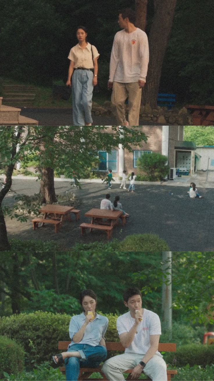 two men are sitting on a bench in the park