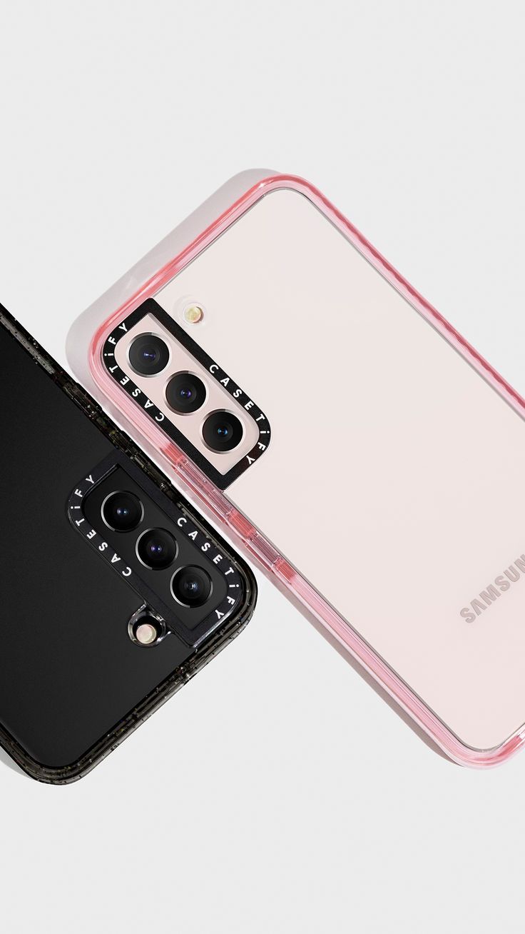 two samsung phones side by side, one in pink and the other in black with buttons