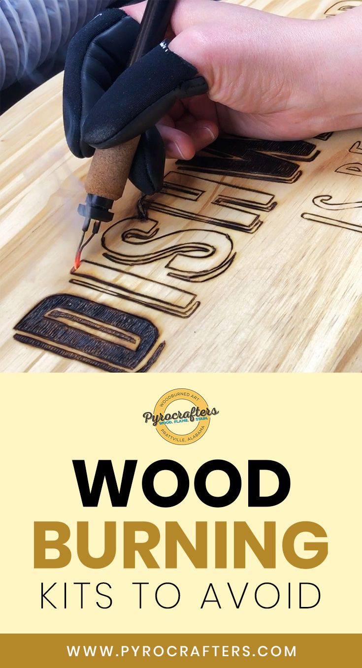 a person using a wood burning tool to cut out letters on a piece of wood