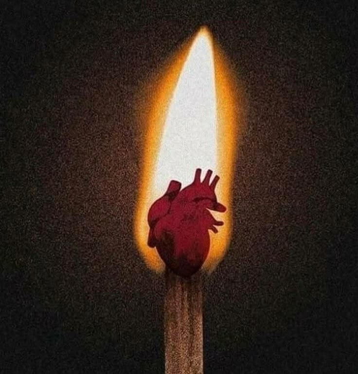 a lit matchstick with a heart on it