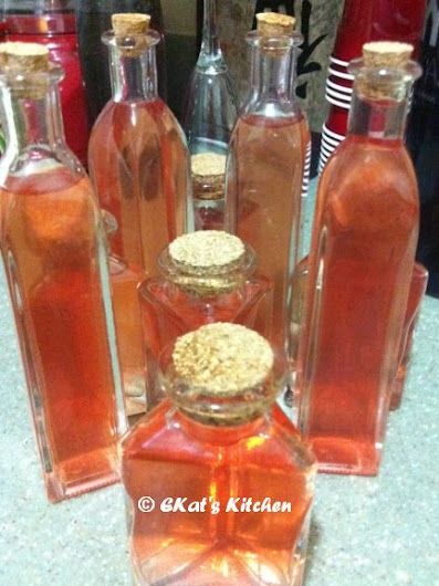 several glass bottles filled with different types of liquid