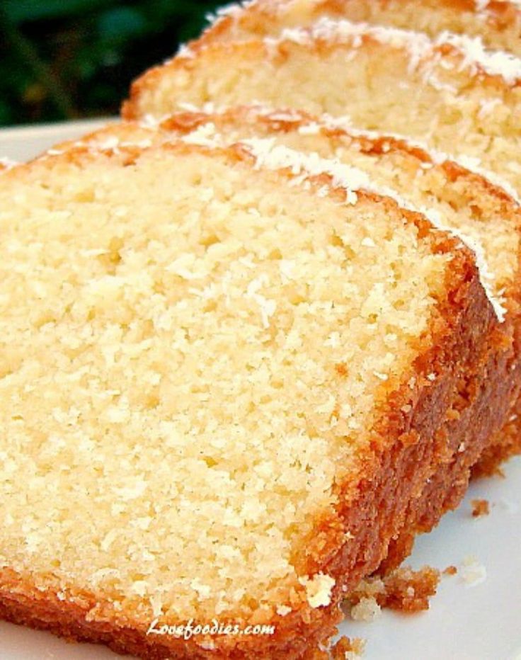 three slices of cake sitting on top of a white plate