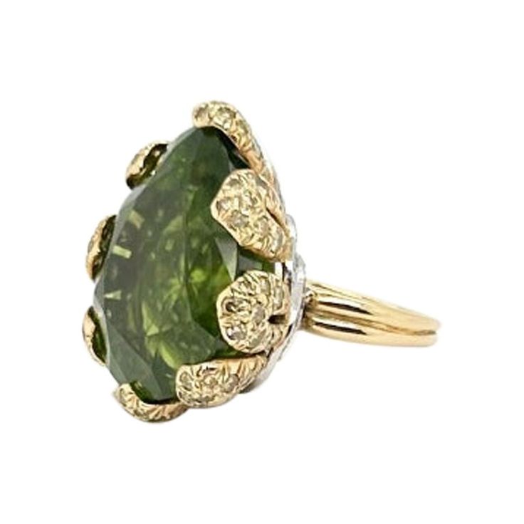 Gorgeous Vendura ring, platinum and 18k YG, yellow color diamonds, peridot approx 20-30 carat, total weight 19 gram and approx size 5.75 Luxury Oval Peridot Rings, Formal Peridot Diamond Ring In Yellow Gold, Green Oval Diamond Ring With Diamond Cut, Luxury Yellow Gold Peridot Rings, Formal Rings With Polished Peridot, Green Marquise Brilliant Cut Rings, Formal Peridot Rings With Polished Finish, Green Pear-shaped 14k Gold Rings, Formal Green Pear-shaped Diamond Ring