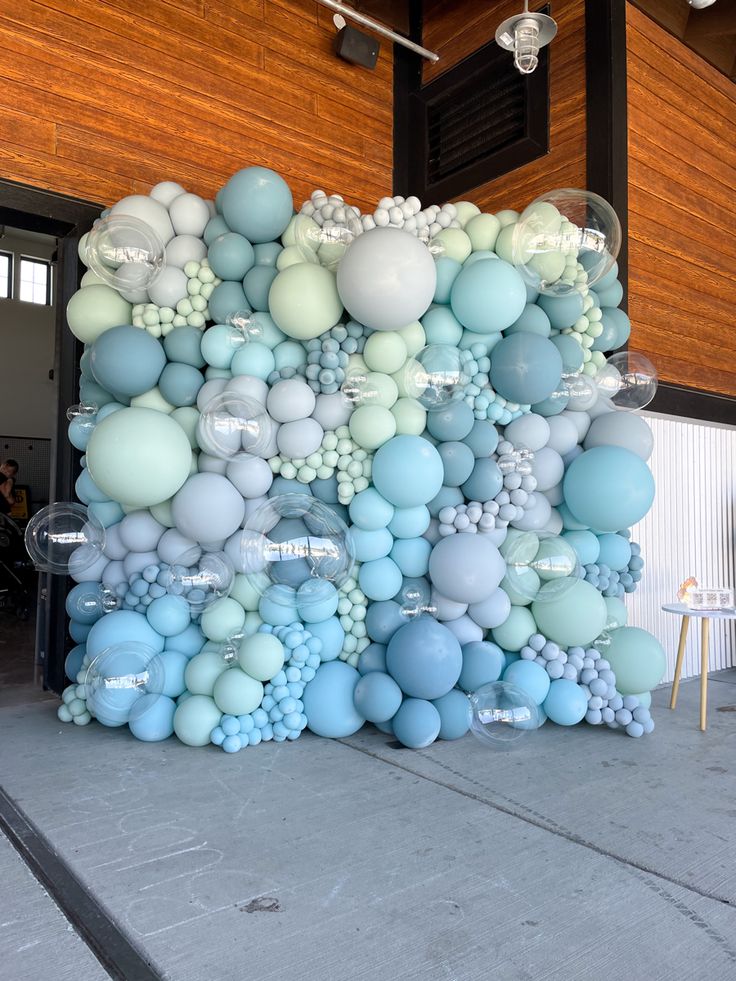 an art installation made out of balloons and balls