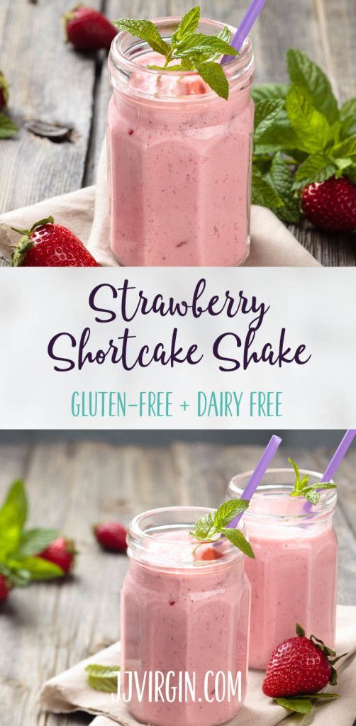 strawberry shortcake shake with strawberries and mint on the side, in mason jars